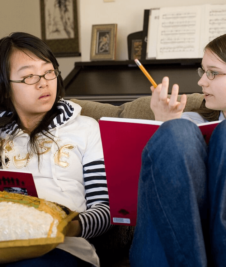 A small group studying the Bahá’í Writings together